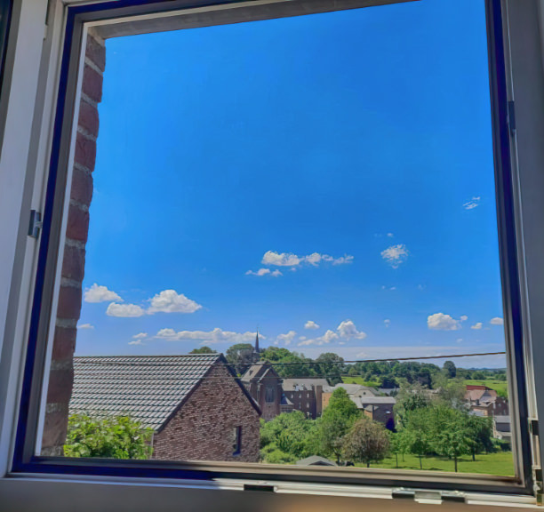 View through window over hills at Mooi Voeren